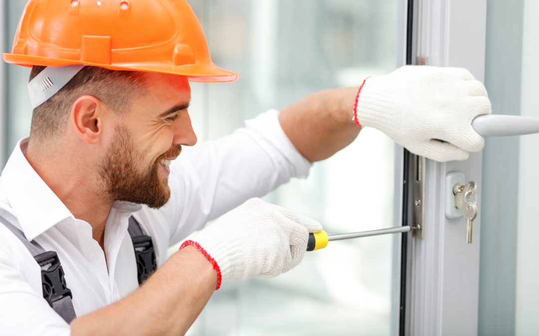 Expert locksmith upgrading a home's security with modern locking systems